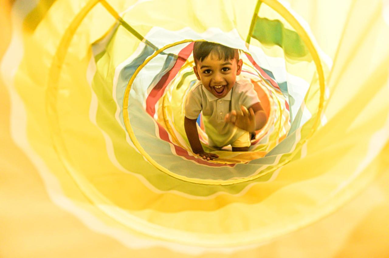The Capital Pearls Hotel Durban Kültér fotó A child playing in a tunnel